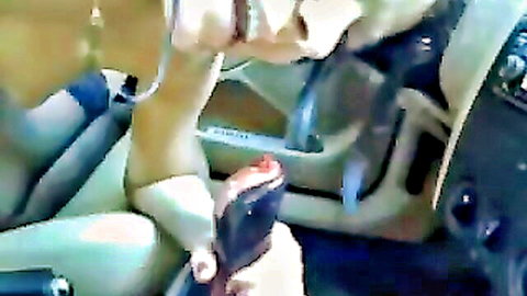 Amateur babe in stockings spreads legs and inserts black dildo into wet pussy in car