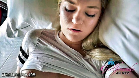 Hot blonde teen sleeping on bed in tight striped tank top teasing small tits