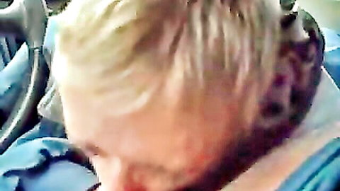 Blonde amateur giving car blowjob to driver, cheap hooker style