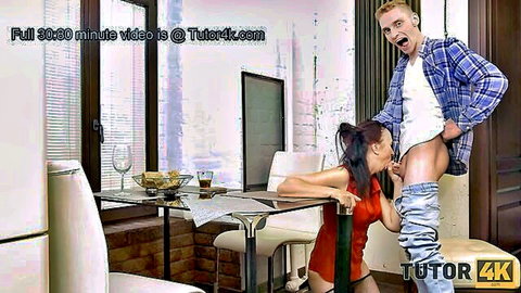 Brunette in red dress kneels for intense blowjob lesson