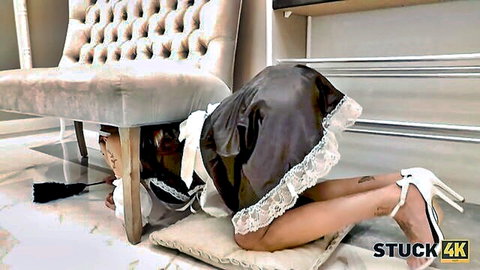 Asian maid stuck under chair with ass up in black uniform