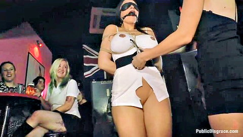 Gagged bound woman exposes shaved pussy in open white dress at crowded public bar