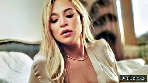 Blake Blossom seductive blonde in open robe showing deep cleavage