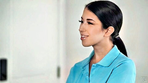 Alex Coal smiling in blue polo shirt, office boss vibe