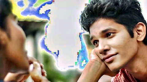 Two handsome Indian men in close intimate conversation