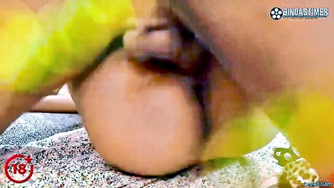 Busty woman squeezes thick hard cock between her massive tits in hot titjob