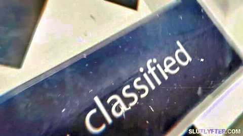 Close-up of classified folder in office teasing secrets in teen porn video