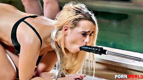 Blonde slut in metal collar deepthroats huge black dildo on rod while fishnet woman holds her poolside