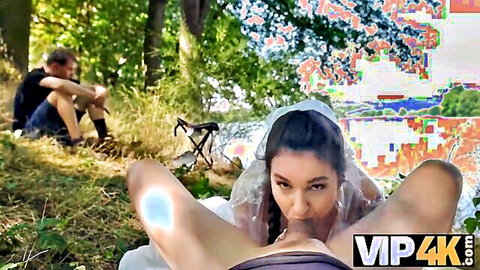 Bride in veil spreads shaved pussy for dildo fuck outdoors while cuckold husband watches