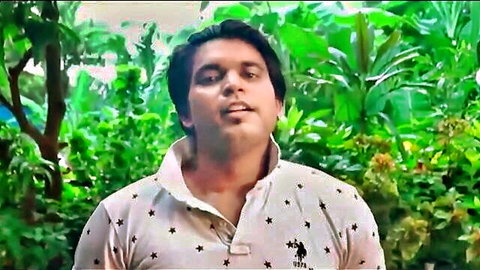 Handsome Indian man in polo shirt, smiling outdoors from Charmsukh Ullu series