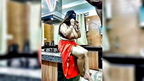 Plump Indian mommy in red skirt posing seductively