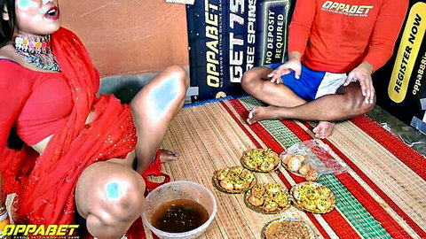 Indian MILF in red saree spreads legs wide teasing thighs with snacks and man nearby