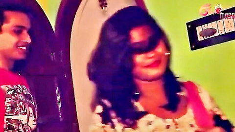 Indian couple tease: blindfolded woman smoking, man smiling close