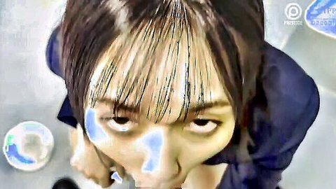 Asian babe in dark uniform intense POV downward glare with bubbles and blue face paint