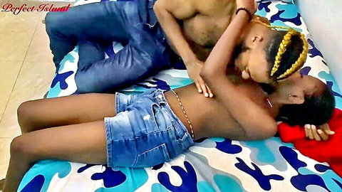 Ebony couple in passionate embrace, topless woman in denim shorts comforted by man
