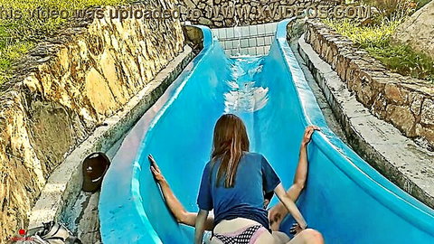 Stepsister stuck on water slide, stepbrother takes advantage in bikini