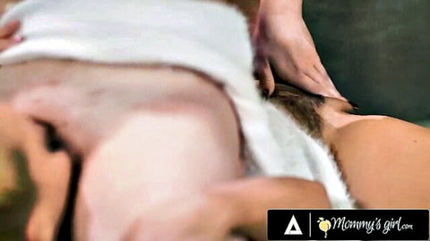 Lesbian mommy spreads naughty girl's legs fingering exposed wet pussy on bed