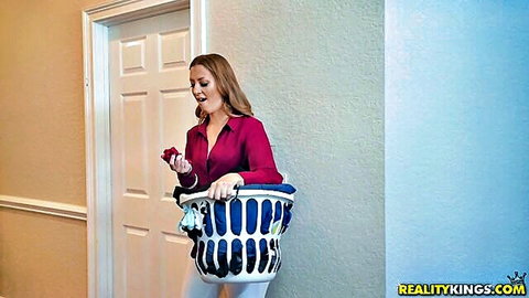 Surprised brunette stepmom with laundry basket in red blouse