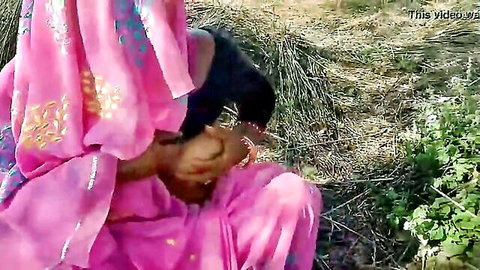 Indian babe in pink saree gets tits groped by man outdoors in hay field