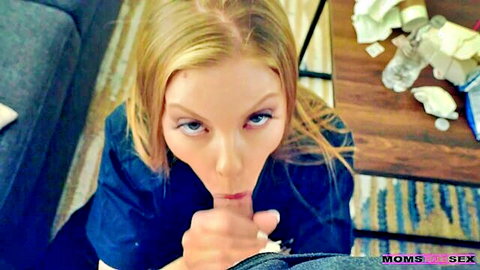 Blonde MILF Britney Amber teases with finger to lips in seductive close-up