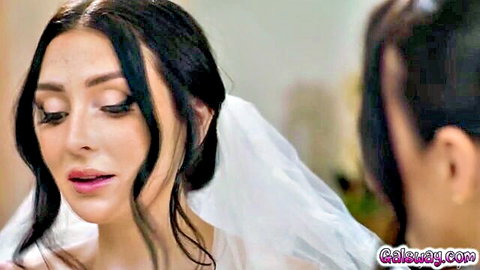 Annie Charlotte in seductive bridal veil, dark hair and lustful gaze