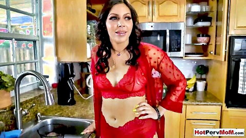 Curvy brunette MILF with huge tits in sheer red lace lingerie teasing in kitchen