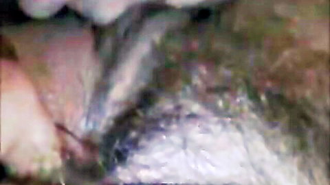 Close-up of mature hairy girlfriend's big aroused pink clit being sucked