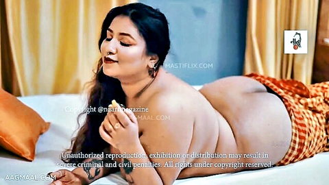 Curvy Indian BBW lying nude, showcasing massive ass in hot erotic pose