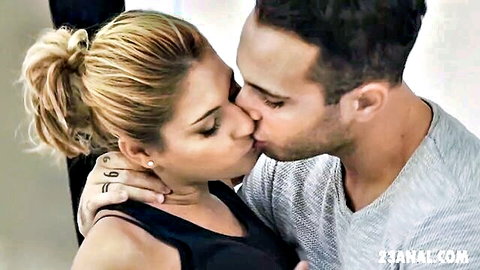 Blonde ponytail babe passionately French kissing handsome guy in gray shirt