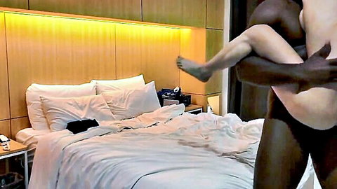Petite Korean wife in interracial sex with muscular black man