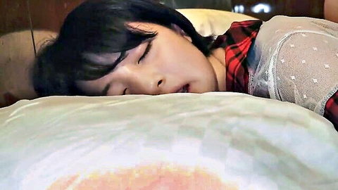Asian woman with black hair sleeping in red plaid shirt and sheer top, softcore solo
