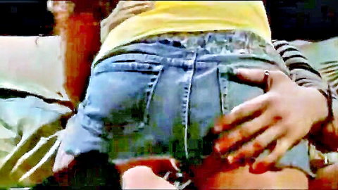 Curvy MILF's big ass in tight denim shorts grabbed by hand in taboo scene