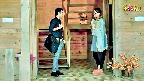 Indian couple chatting outside wooden hut in Chul Loveria Kooku web series
