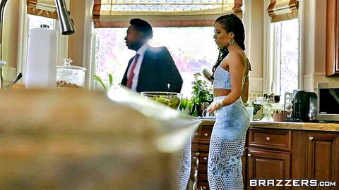 Kira Noir in sexy lace dress teasing with suited black stud in Brazzers anal reunion