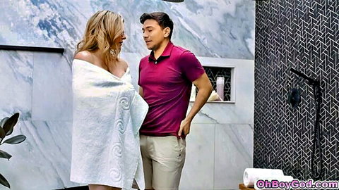Blonde MILF in towel exposing huge tits cleavage to stepson in steamy bathroom