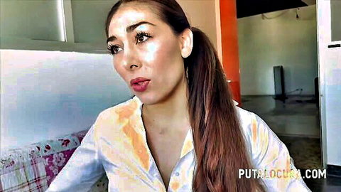 Alluring Lilith in sheer yellow blouse, seductive gaze, amateur tease