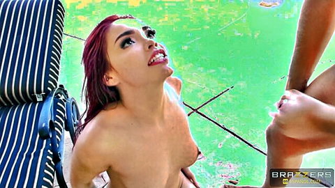 Selena Santana oiled nude by pool, looking up seductively in Brazzers fingering scene