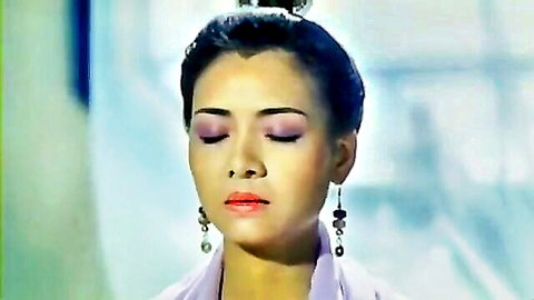 Serene Chinese beauty in purple top, close-up bath scene thumbnail