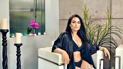 Gabriella Paltrova in open black robe and lingerie at spa