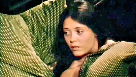 Patricia Rhomberg in intense gaze, curvy German star in green robe scene