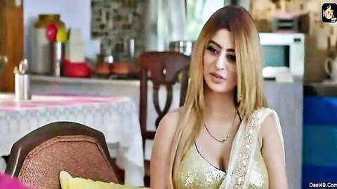 Curvy Indian babe in low-cut gold saree blouse flaunting deep cleavage and medium tits in kitchen