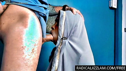 Tattooed black guy rams huge BBC deep into hijabi woman's exposed pussy doggystyle