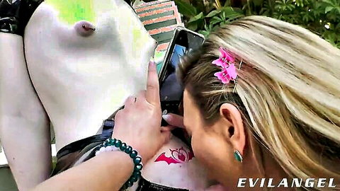 Blonde babe grabs huge white trans cock while snapping naughty selfie outdoors