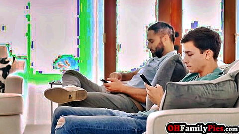 Bearded stepdad and teen relax on couch before stepmom blowjob action