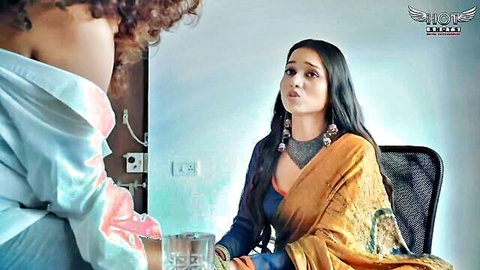 Indian woman in saree reacts surprised as man leans in for naughty roleplay