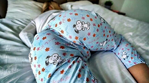 Blonde step-sis in Snoopy pajamas shows off her big ass on bed, teasing for bro