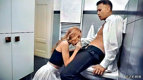 Tiffany Tatum kneels and gives blowjob to stud in bathroom