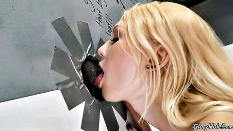White blonde bombshell slurping huge black dick through gloryhole