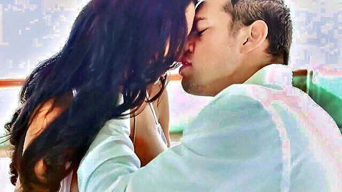 Curvy brunette with huge tits passionately kissing handsome man in suit