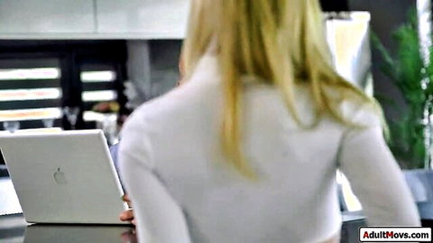 Blonde Candee Licious in white sweater holding laptop from behind